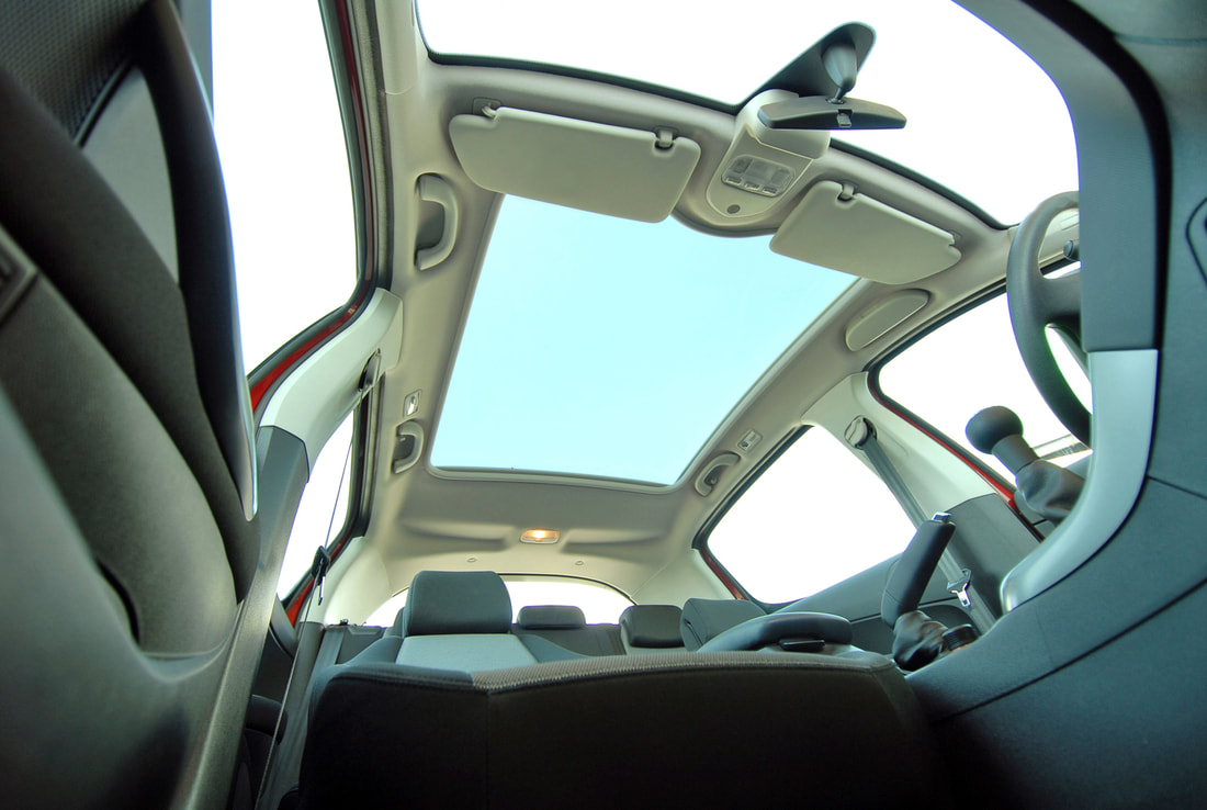 car with wide sunroof glass